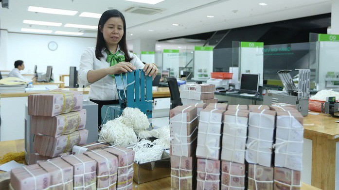 Sau hơn một tháng phải bơm ròng hỗ trợ, thị trường liên tiếp có những phiên Ngân hàng Nhà nước hút ròng lượng lớn tiền về trong tuần này - Ảnh: Quang Phúc.