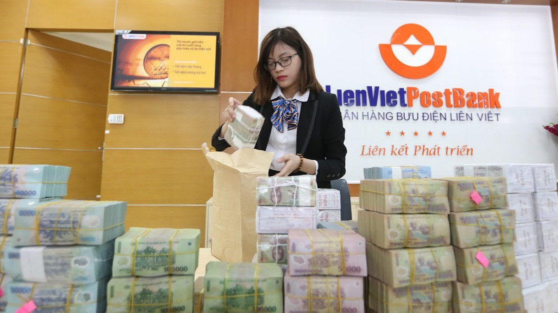 Năm 2018, Ngân hàng Nhà nước thực hiện cơ chế giao chỉ tiêu tăng trưởng tín dụng cho từng thành viên chặt chẽ hơn so với những năm trước - Ảnh: Quang Phúc.