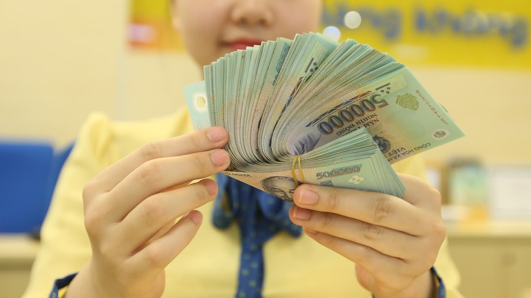 Ước tính đến cuối tháng 12/2018, toàn hệ thống các tổ chức tín dụng đã xử lý được 149,22 nghìn tỷ đồng nợ xấu - Ảnh: Quang Phúc.