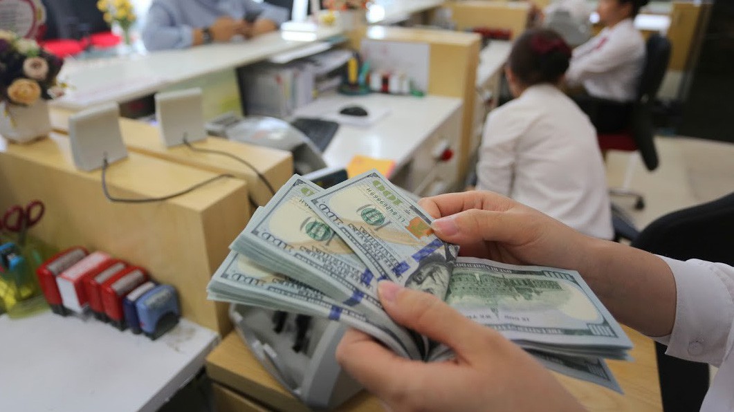 Lãnh đạo Ngân hàng Nhà nước cho biết, năm 2018 mặc dù dòng vốn có xu hướng đảo chiều tại nhiều thị trường nhưng tại Việt Nam gần như không diễn ra - Ảnh: Quang Phúc.