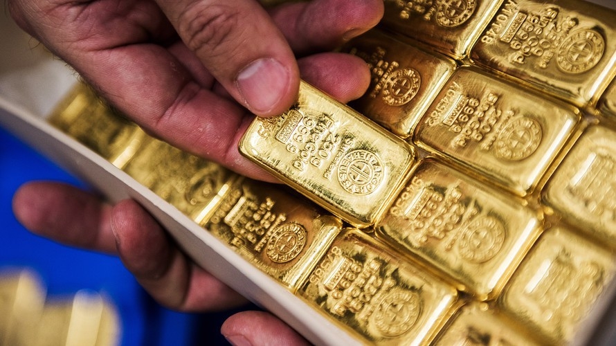 Giá vàng thế giới đã vượt được ngưỡng cản 1.300 USD/oz - Ảnh: Bloomberg.