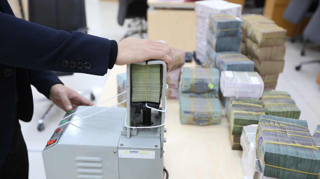 Cả quy mô vốn điều lệ và vốn tự có của khối ngân hàng thương mại nhà nước đến cuối 2018 đều thấp hơn nhiều so với khối ngân hàng thương mại cổ phần tư nhân, nhưng lại đang chiếm tỷ trọng và quy mô tổng tài sản lớn hơn - Ảnh: Quang Phúc.