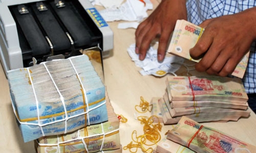 Nợ xấu giảm do “ngân hàng bắt tay doanh nghiệp”