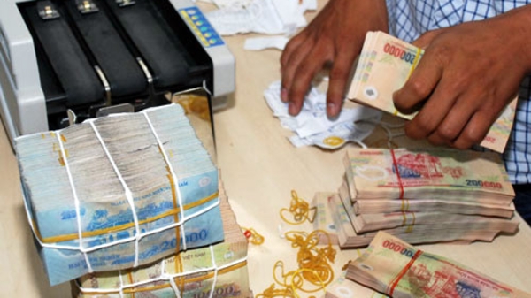 Nợ xấu giảm do “ngân hàng bắt tay doanh nghiệp”