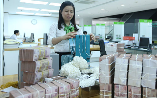 Tính đến đầu tuần này, lượng tín phiếu của Ngân hàng Nhà nước đang lưu hành đã lên tới gần 54.000 tỷ đồng - Ảnh: Quang Phúc.<br>