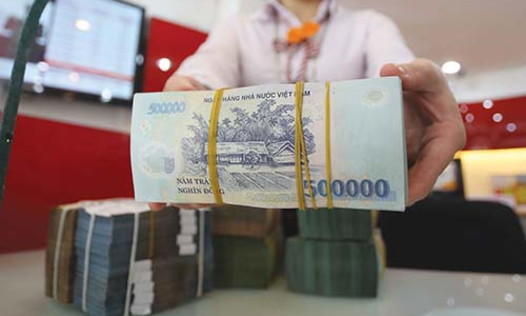 Tổng dư nợ tín dụng ngân hàng cũng như cái bánh GDP danh nghĩa đã to hơn đáng kể sau 5 năm, giúp tỉ lệ nợ xấu loãng bớt.