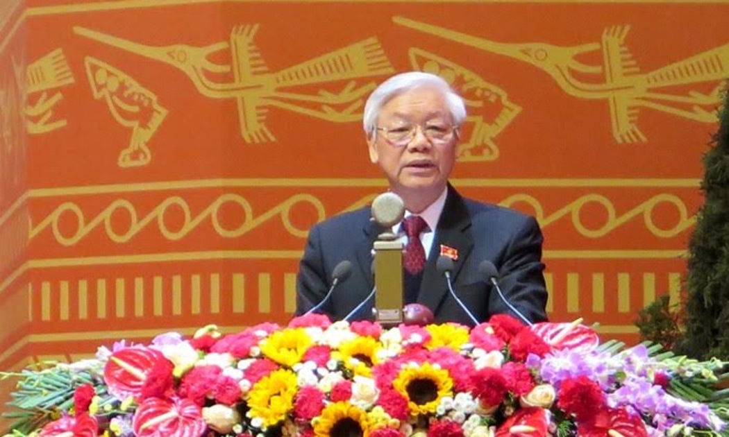 Tổng bí thư Nguyễn Phú Trọng trình bày báo cáo của Ban Chấp hành Trung ương Đảng khóa 11, tại lễ khai mạc Đại hội Đảng lần thứ 12, diễn ra sáng 21/1 tại Hà Nội.
