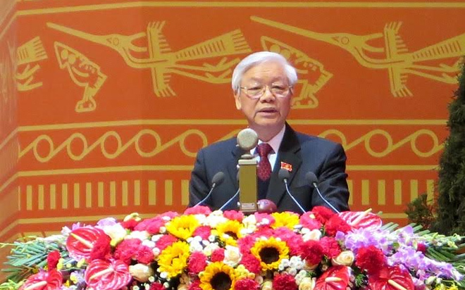 Tổng bí thư Nguyễn Phú Trọng trình bày báo cáo của Ban Chấp hành Trung ương Đảng khóa 11, tại lễ khai mạc Đại hội Đảng lần thứ 12, diễn ra sáng 21/1 tại Hà Nội.<br>