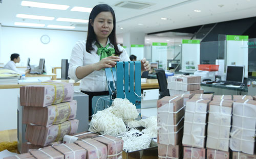 Dù có thể chưa sửa Thông tư 36, nhưng dự kiến Ngân hàng Nhà nước vẫn sẽ giám sát chặt chẽ để phòng ngừa rủi ro tiềm ẩn đối với thanh khoản hệ thống - Ảnh: Quang Phúc.<br>