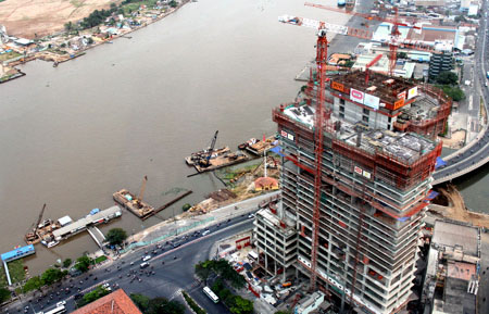 Ổn định kinh tế vĩ mô, kiềm chế lạm phát ở mức thấp hơn và nâng cao tốc 
độ tăng trưởng GDP cao hơn năm 2012... là các nội dung được nhấn mạnh 
tại mục tiêu tổng quát của Tp.HCM trong năm 2013 - Ảnh: Quốc Huy.