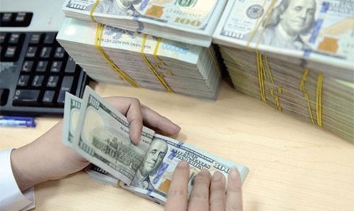 Tiếp tục nhập siêu, tỷ giá USD/VND giữ mức cao