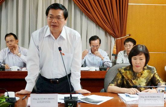 Ông Vũ Huy Hoàng và bà Hồ Thị Kim Thoa trong một buổi làm VGP.<br>
