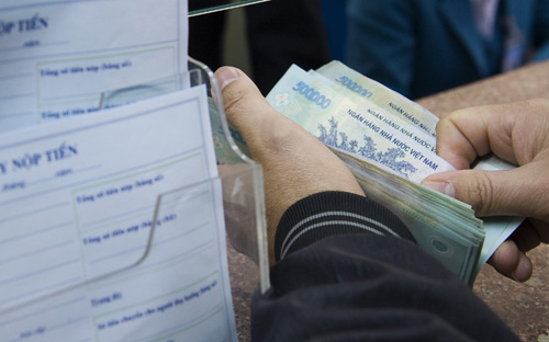 Đã hơn một năm các tổ chức tín dụng được thực hiện cơ cấu lại nợ cho các
 doanh nghiệp khó khăn nhưng có triển vọng phục hồi và trả nợ, theo 
Quyết định 780 của Ngân hàng Nhà nước - Ảnh: Việt Tuấn.<br>