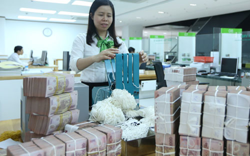 Năm 2017, Vietcombank đặt chỉ tiêu lợi nhuận trước thuế cách biệt so với các ngân hàng cùng tương quan so sánh - Ảnh: Quang Phúc.<br>