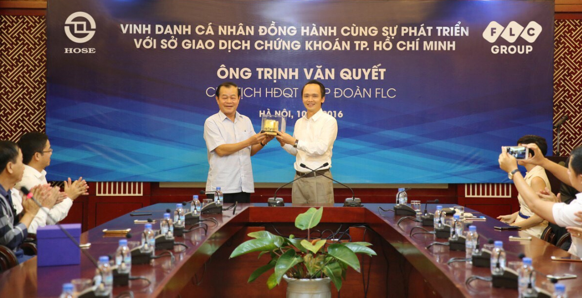 Ông Trần Đắc Sinh, Chủ tịch HOSE và ông Trịnh Văn Quyết, Chủ tịch FLC tại buổi lễ.<br>