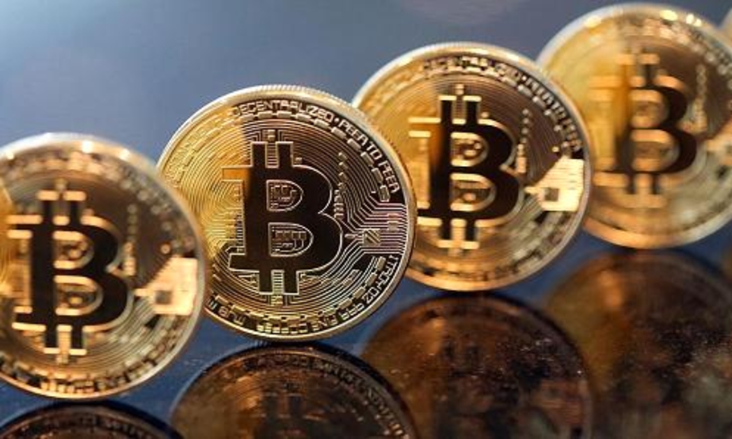 Trong mấy tháng gần đây, giá tiền ảo Bitcoin tăng mạnh liên tục - Ảnh: Getty/Bloomberg.