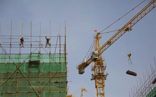 Một công trường xây dựng ở Bắc Kinh, Trung Quốc, hôm 14/4/2016 - Ảnh: Reuters.<br>