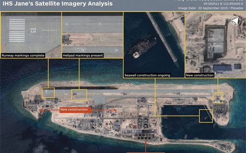 Hình ảnh chụp từ vệ tinh cho thấy hoạt động xây dựng của Trung Quốc ở 
bãi Chữ Thập thuộc quần đảo Trường Sa của Việt Nam - Ảnh: IHS 
Jane's/WSJ.