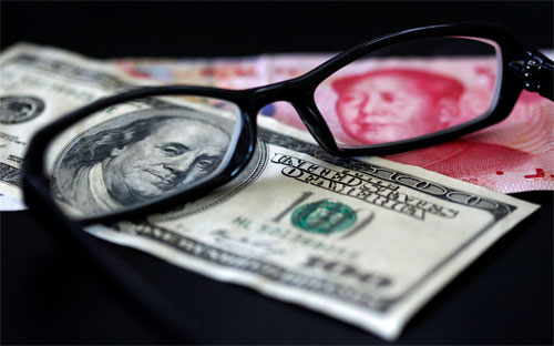 Ngân hàng JPMorgan Chase ngày 7/1 đã hạ dự báo tỷ giá Nhân dân tệ vào 
cuối năm nay về mức 6,9 Nhân dân tệ/USD, từ mức 6,7 Nhân dân tệ/USD 
trước đó. 