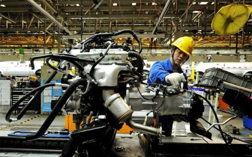PMI ngành sản xuất của Trung Quốc tăng lên mức 50,2 điểm trong tháng 3, từ mức 49 điểm trong tháng 2 - Ảnh: Reuters.<br>