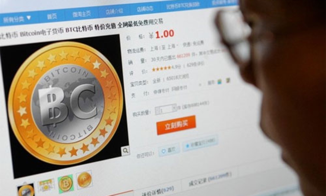 Một nhà đầu tư Trung Quốc đang giao dịch Bitcoin - Ảnh: Imaginechina/Zuma Press.