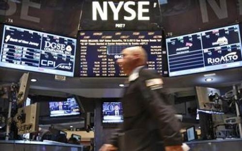 Đà đi lên của Dow Jones trong phiên giao dịch ngày 29/1 chủ yếu là nhờ sự dẫn dắt của nhóm cổ phiếu phòng thủ - <i>Ảnh: Reuters</i>.<br>