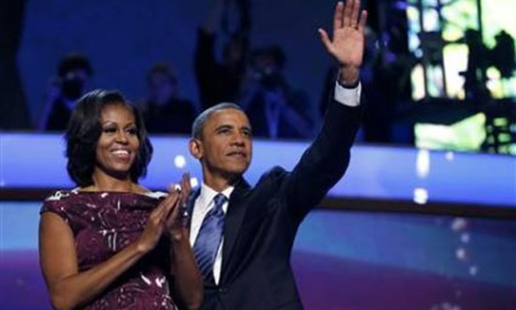 Tổng thống Mỹ Barack Obama và phu nhân Michelle ngày 6/9 - Ảnh: Reuters.