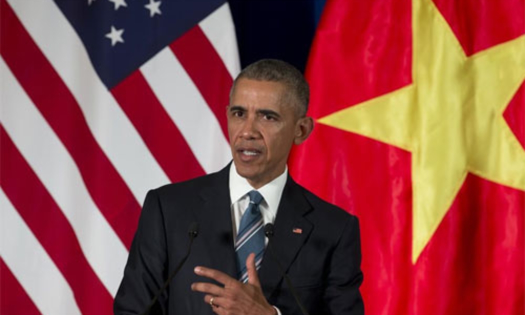 Tổng thống Mỹ Barack Obama trong cuộc họp báo với Chủ tịch Trần Đại Quang ngày 23/3 tại Hà Nội - Ảnh: AP/Time.