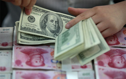 Ngày 7/1, tỷ giá đồng Nhân dân tệ so với USD rớt xuống mức thấp nhất trong 5 năm. 