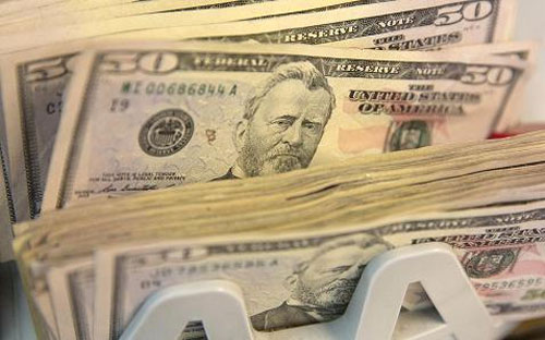  Nguyên nhân khiến USD tăng giá là những bình luận cứng rắn của quan 
chức FED mấy ngày gần đây khiến giới giao dịch phải đánh giá lại kỳ vọng
 lãi suất - Ảnh: CNBC/Getty/Bloomberg.<br>