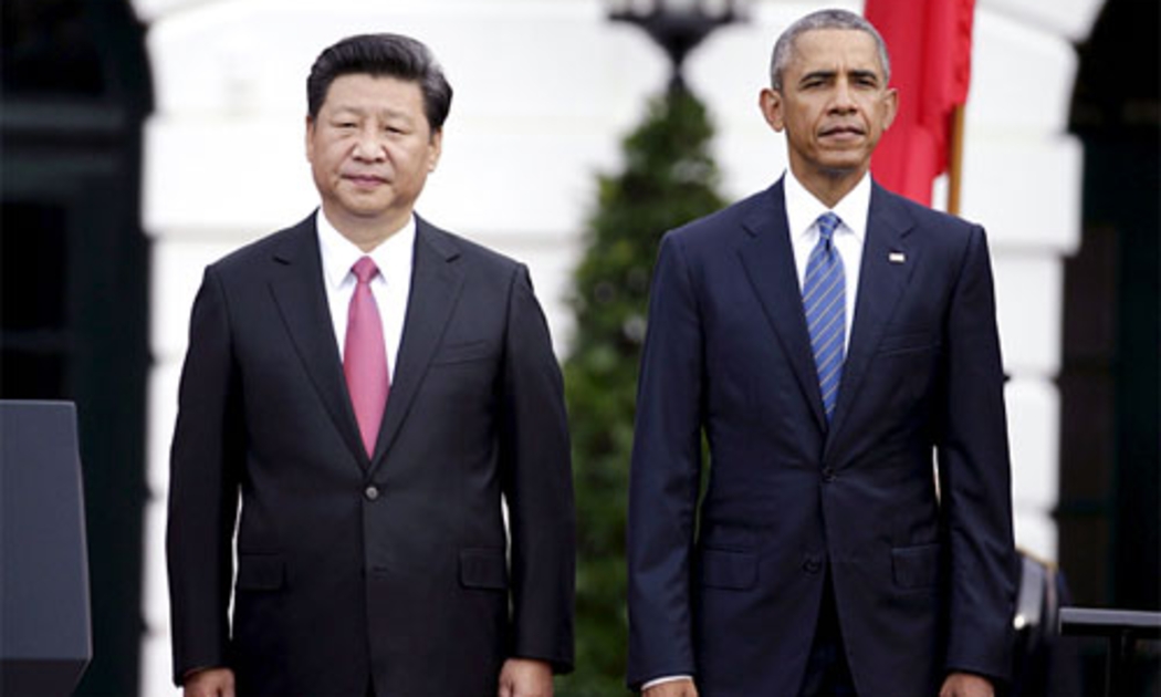 Chủ tịch Trung Quốc Tập Cận Bình (trái) và Tổng thống Mỹ Barack Obama trong chuyến thăm Mỹ vào tháng 9/2015 của ông Tập - Ảnh: Reuters.<br>