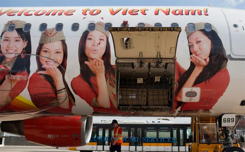 Năm 2015, VietJet chở 9,3 triệu lượt hành khách, tăng 66% so với năm 2014 - Ảnh: Bloomberg.<br>