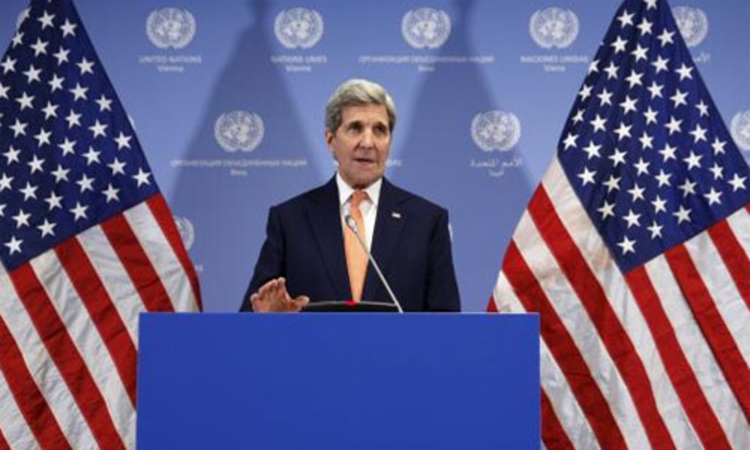Ngoại trưởng Mỹ John Kerry tuyên bố dỡ bỏ lệnh trừng phạt đối với Iran, tại Vienna, Áo, ngày 16/1 - Ảnh: Reuters.<br>