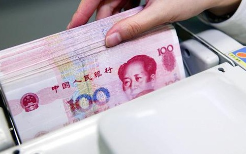 Do tỷ giá đồng Nhân dân tệ được neo vào đồng USD, nên khi đồng USD tăng 
giá, đồng Nhân dân tệ cũng tăng giá so với các đồng tiền khác - Ảnh: Getty/CNBC. 