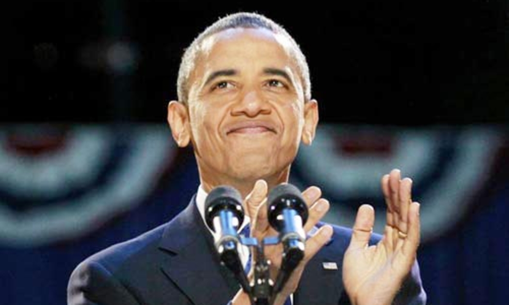 Tổng thống tái đắc cử Barack Obama ăn mừng chiến thắng với các cử tri ủng hộ ông tại Chicago đêm 6/11 (giờ địa phương) - Ảnh: Reuters.