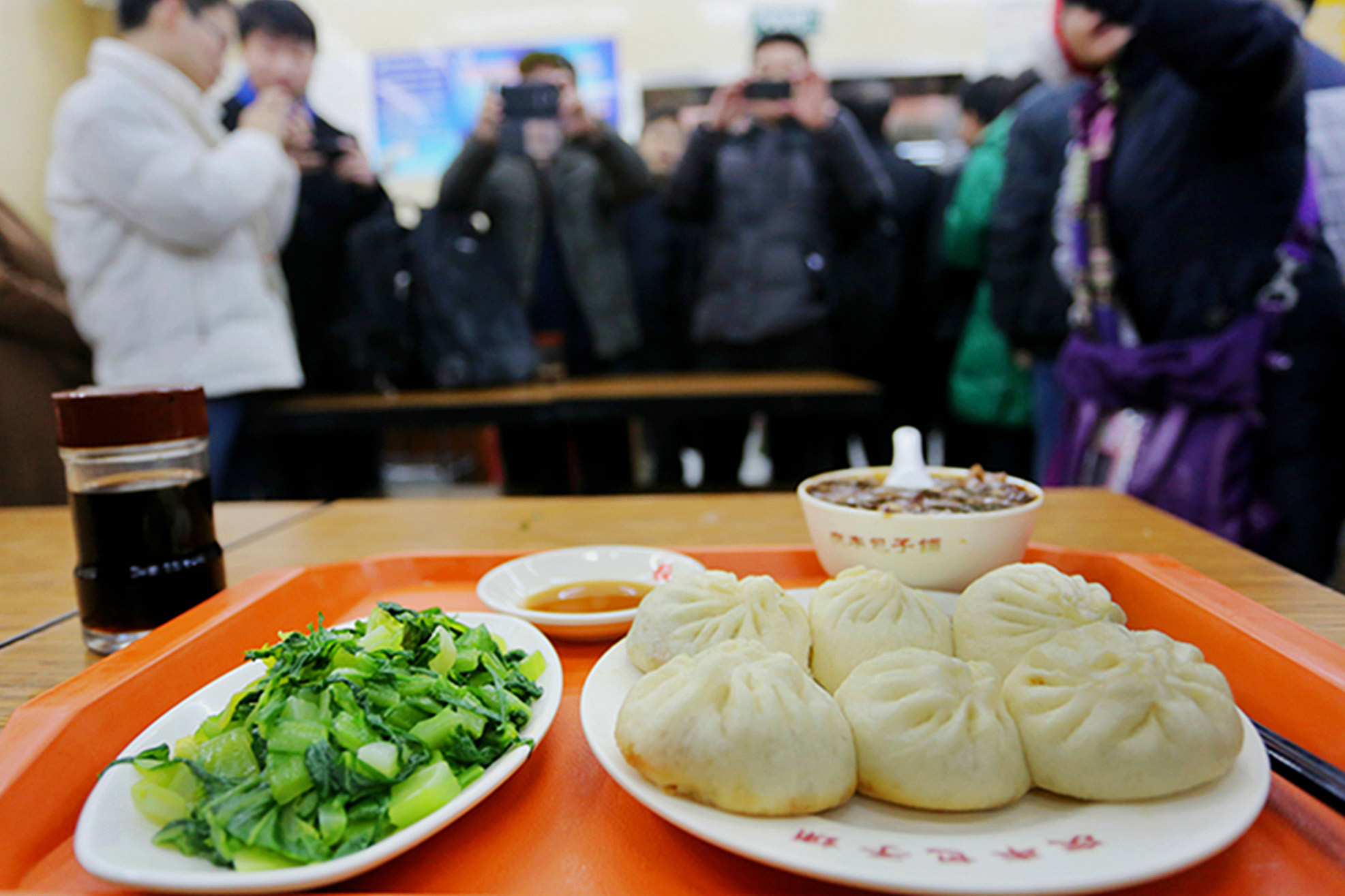 "Suất ăn của Chủ tịch" ở hiệu bánh bao Qing Feng, Bắc Kinh - Ảnh: Imagine China/Bloomberg.<br>