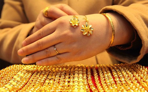 Triển vọng u ám của nền kinh tế toàn cầu đã trở thành lý do để các nhà đầu tư quay trở lại với vàng - Ảnh: CFP.<br>