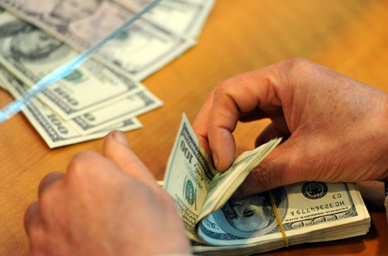 Một số chủ nợ cho rằng, Ngân hàng Nhà nước nên tái cấp vốn để hỗ trợ cho những ngân hàng yếu kém thanh khoản, để họ có tiền trang trải nợ nần cho bên vay, trong đó có khoản nợ trên thị trường 2 - Ảnh: Hoàng Hà.