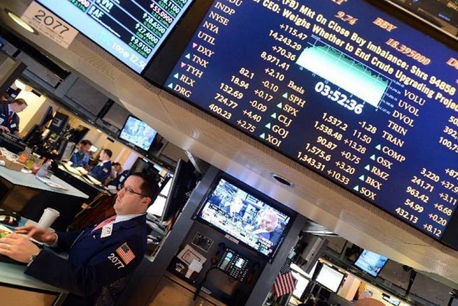 Phiên giao dịch ngày 5/3, chỉ số công nghiệp Dow Jones đã chọc thủng ngưỡng cản xác lập năm 2007, để thiết lập mốc cao kỷ lục mới -<i> Ảnh: THX.</i><br>