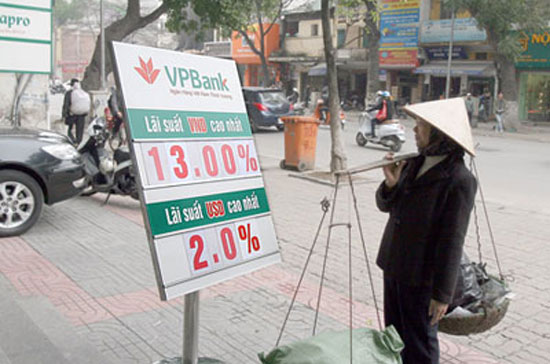 Sau khi giảm về 13%/năm, trần lãi suất huy động VND được xác định sẽ tiếp tục điều chỉnh.