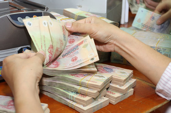 Việc cơ cấu lại nợ góp phần tháo gỡ khó khăn cho doanh nghiệp và cả ngân hàng.