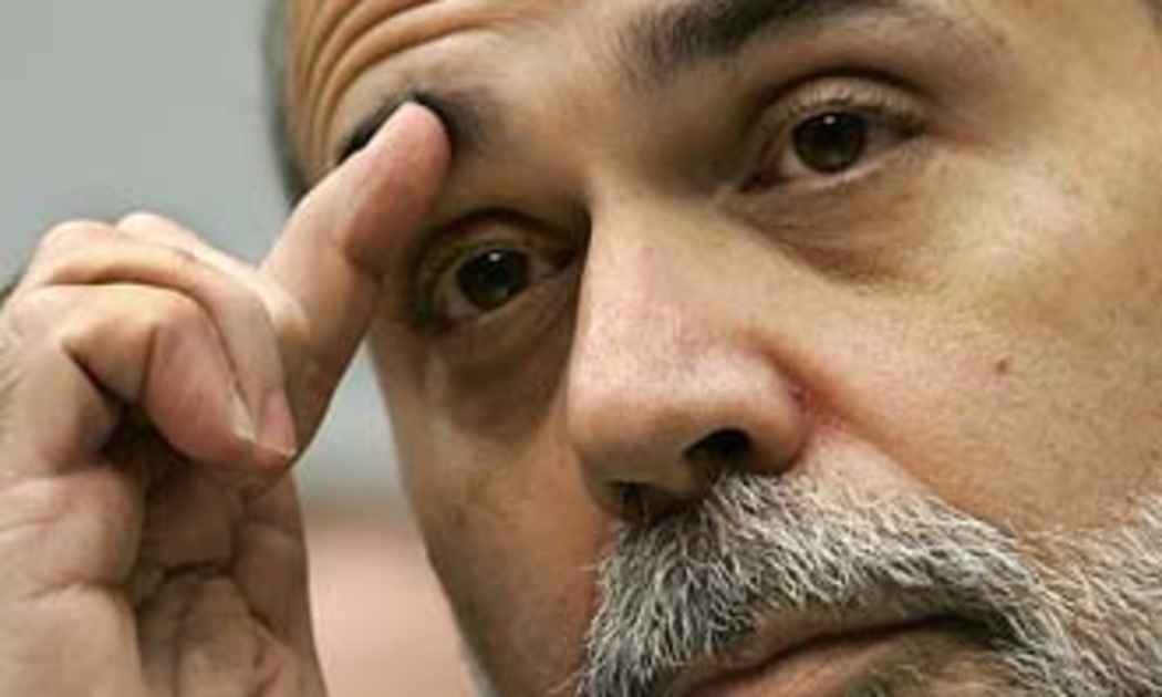 Khuôn mặt trầm tư của đương kim Chủ tịch FED, ông Ben Bernanke.