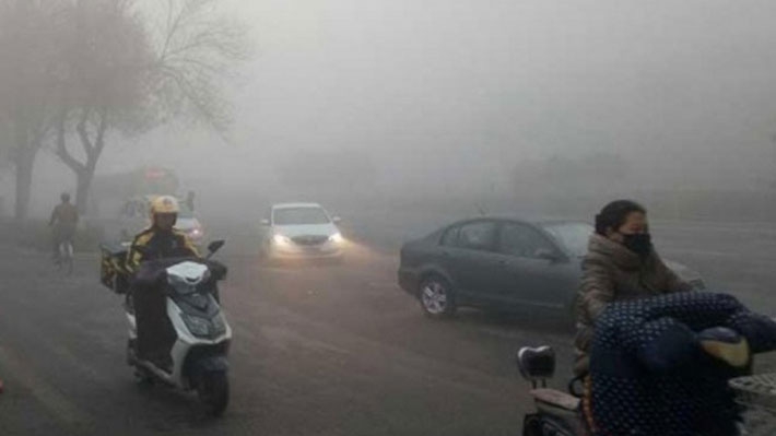 Bắc Kinh chìm trong khói mù sáng 27/10 - Ảnh: SCMP.