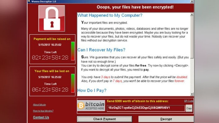Ảnh chụp màn hình một máy tính bị mã độc WannaCry tấn công đòi tiền chuộc hồi tháng 5/2017 - Ảnh: Reuters.