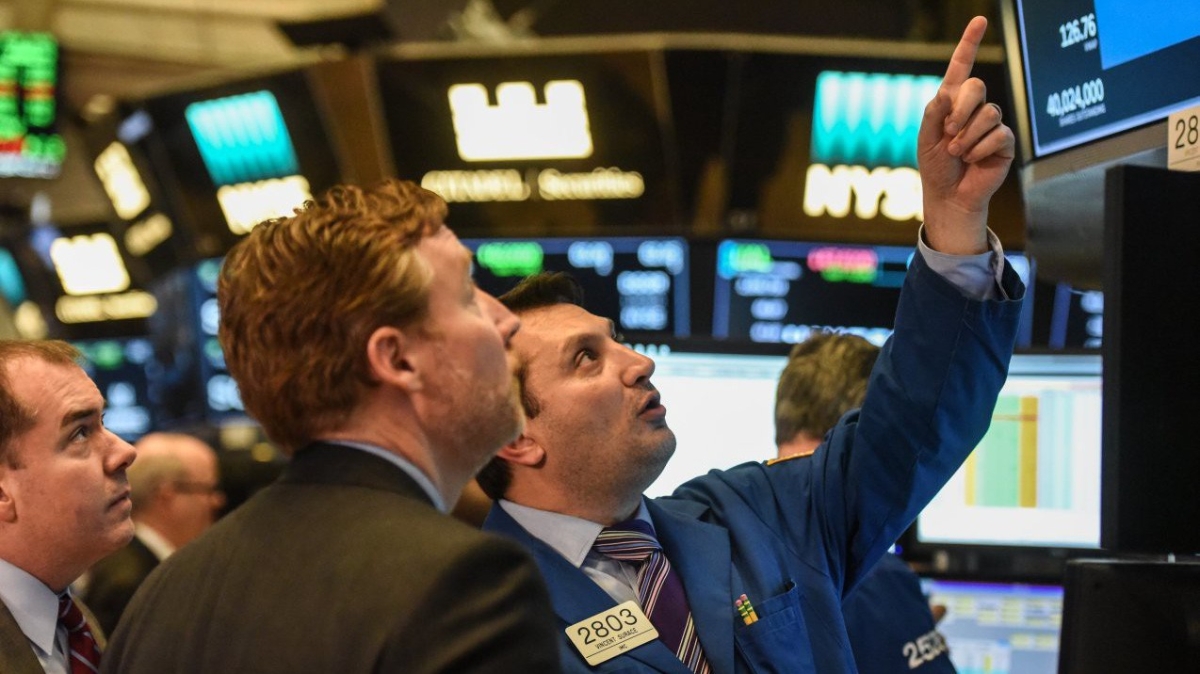 Chứng khoán Mỹ tăng điểm mạnh trong năm 2017, giúp người Mỹ tăng giá trị tài sản - Ảnh: Getty/WSJ.