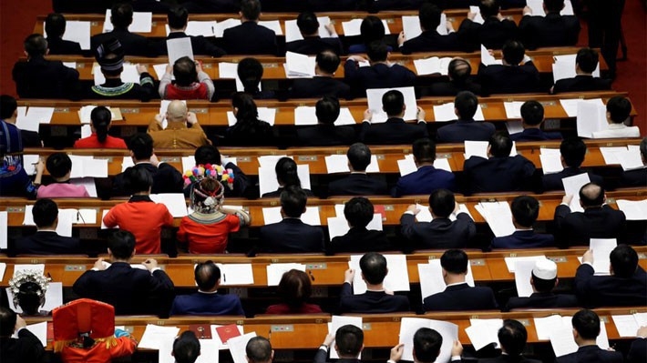 Các đại biểu Quốc hội Trung Quốc trong một phiên họp tại Đại lễ đường Nhân dân ở Bắc Kinh, ngày 13/3 - Ảnh: Reuters.