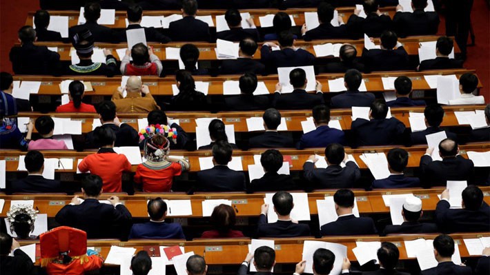 Các đại biểu Quốc hội Trung Quốc trong một phiên họp tại Đại lễ đường Nhân dân ở Bắc Kinh, ngày 13/3 - Ảnh: Reuters.