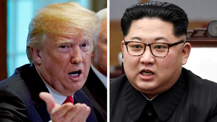 Tổng thống Mỹ Donald Trump (trái) và nhà lãnh đạo Triều Tiên Kim Jong Un  - Ảnh: Reuters.