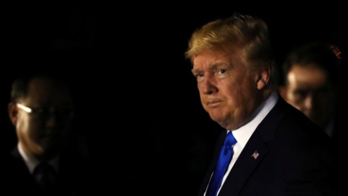 Những hình ảnh đầu tiên của ông Trump và ông Kim Jong Un ở Singapore - Ảnh 1.