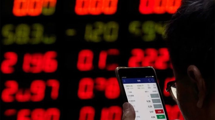 Bản báo cáo cảnh báo rằng mức độ mua cổ phiếu bằng vay nợ trên thị trường chứng khoán Trung Quốc đã đạt mức cao như hồi năm 2015 - Ảnh: SCMP.